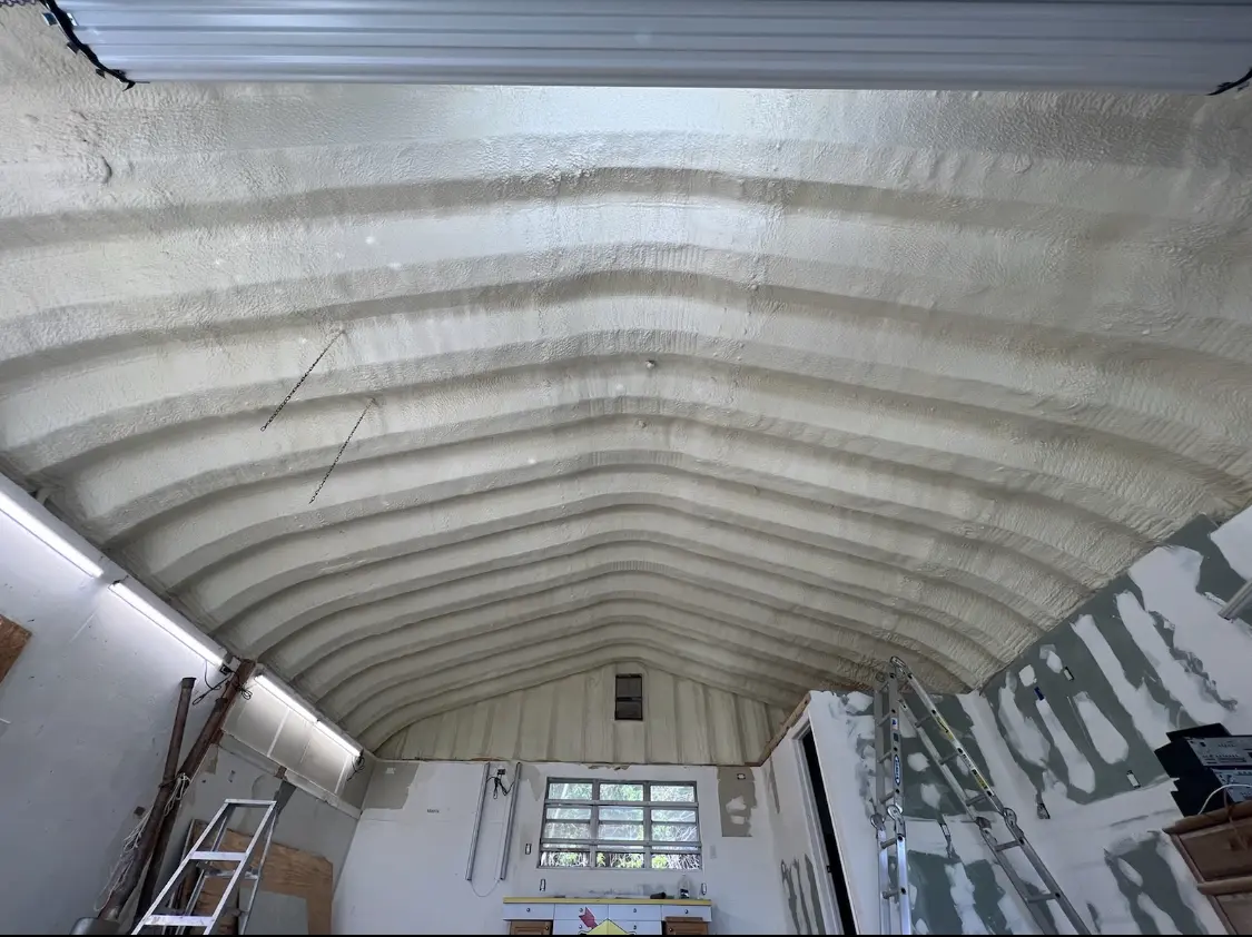 Spray polyurethane foam applied to the underside of a metal roof deck in Willow Springs
